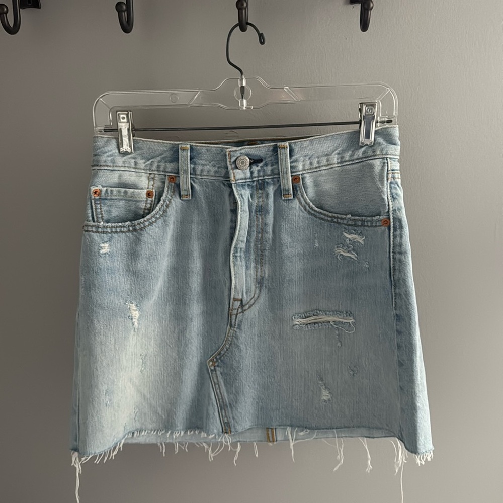 Levi’s light wash denim, lightly distressed skirt